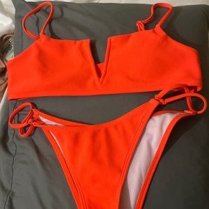 Neon orange bathing suit